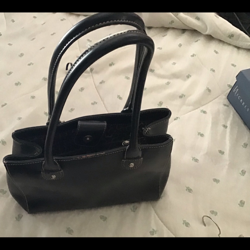 Black genuine Leather pocketbook.